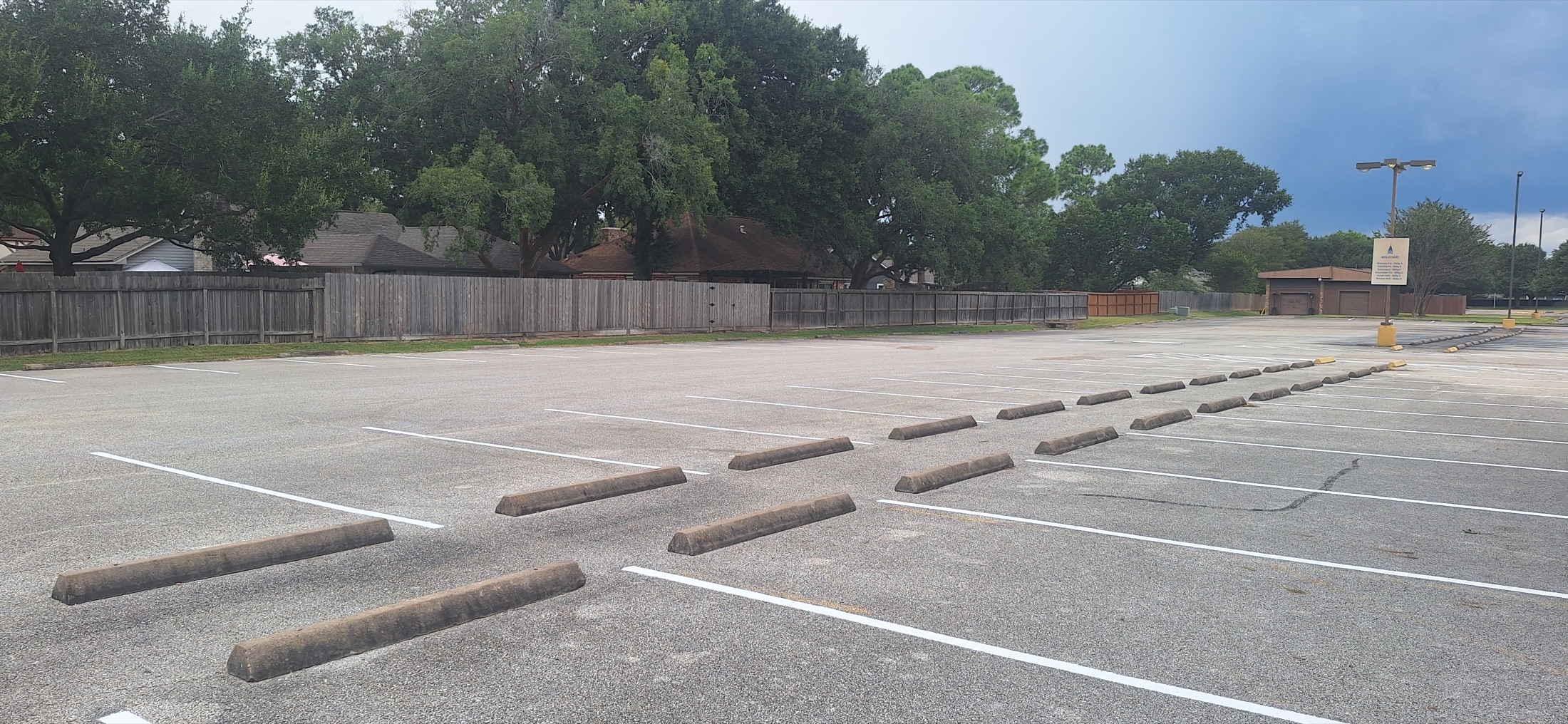 Fresh white parking lines across an additional Sugar Land Methodist Church lot